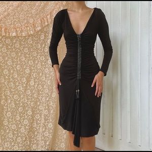 Black dress with leather tassels